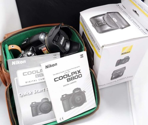 Lot 1131 - A Nikon Coolpix 8800 digital camera, with...