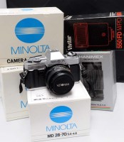 Lot 1163 - A Minolta X300 SLR camera fitted MD 50mm f1.7...