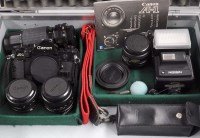 Lot 1171 - A Canon A1 SLR camera with FD 50mm f1.8 and FD...