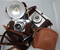 Lot 1176 - A Voigtlander Vito B 35mm camera, in leather...