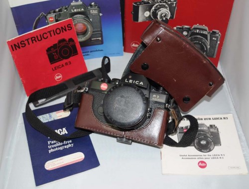 Lot 1183 - A Leica R3 SLR camera, fitted Summicron-R 50mm...