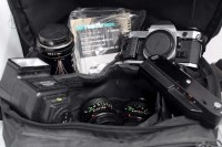 Lot 1229 - A Canon AE-1 program SLR camera with 50mm f1.8...