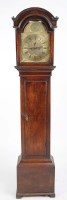 Lot 1268 - An oak longcase clock, the brass roman dial...