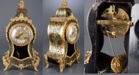 Lot 1274 - A French Boullework mantel clock, gilt and...