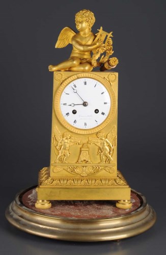 Lot 1282 - A French gilt bronze mantel clock, the...