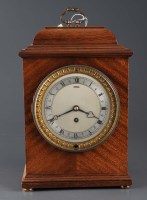 Lot 1283 - A mahogany timepiece, the silvered roman dial...