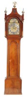 Lot 1284 - A mahogany longcase clock, the arched brass...