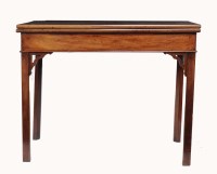 Lot 1314 - A George III mahogany turnover tea table, the...