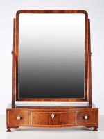 Lot 1328 - A late Georgian mahogany swing frame toilet...