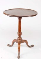 Lot 1343 - A George III circular mahogany tip-up-top...