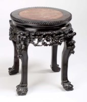 Lot 1350 - An Oriental hardwood jardiniere stand with...