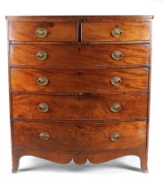 Lot 1371 - A Georgian mahogany bowfront chest of two...