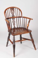 Lot 1376 - A 19th Century yew wood Windsor armchair, with...