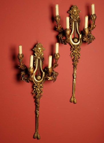 Lot 1421 - A pair of French ormolu wall lights, possibly...