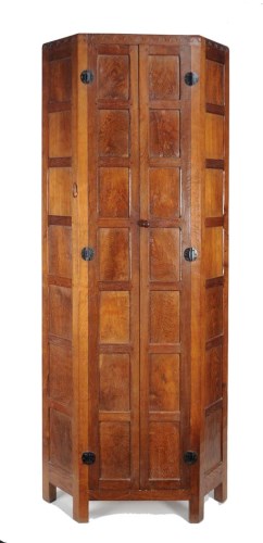 Lot 1423 - A Mouseman oak corner wardrobe, with a pair of...