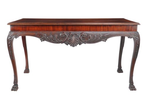 Lot 1427 - A rectangular mahogany side table with ornate...