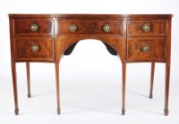 Lot 1431 - A late George III mahogany serpentine front...