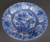 Lot 216 - A Dutch Delft plate, decorated in Kraak...