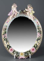 Lot 235 - A porcelain mirror, probably Sitzendorf, early...