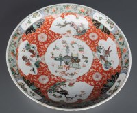 Lot 294 - A Famille vert saucer dish, with central...