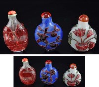 Lot 345 - Three Peking glass overlaid snuff bottles, a...