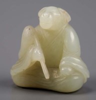 Lot 358 - A pale Celadon jade 'Zodiac' figure, 18th...