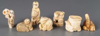 Lot 374 - A collection of six carved ivory netsuke, to...