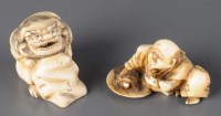 Lot 375 - A carved ivory netsuke, unsigned, of a man...