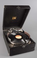 Lot 454 - An HMV portable gramophone, with 9 1/2in....