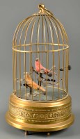 Lot 469 - A 20th Century musical bird cadge, with two...