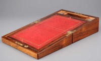 Lot 506 - A 19th Century rosewood writing slope, the top...