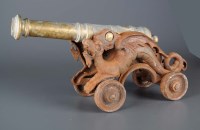 Lot 507 - RETURN TO VENDOR A fireside cannon, with cast...