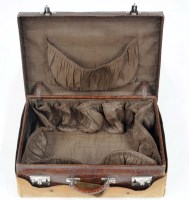 Lot 510 - An early 20th Century crocodile skin suitcase,...