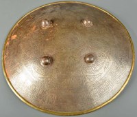 Lot 526 - A 19th Century Indian steel shield (Dhal), the...