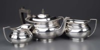 Lot 608 - A George V three-piece tea service, by Barker...