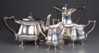 Lot 614 - An Edwardian four-piece tea service, by Reid &...