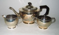 Lot 617 - A George V three-piece tea service, by William...