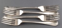 Lot 632 - Four George III table forks, by Josiah &...