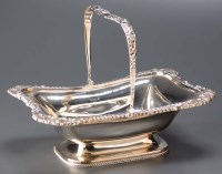 Lot 648 - An Edwardian swing-handled cake basket, by...