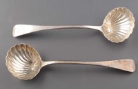 Lot 676 - A pair of William IV sauce ladles, by William...