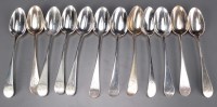 Lot 683 - Twelve George III dessert spoons, date and...