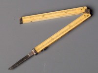 Lot 704 - An ivory folding combination knife, pencil and...