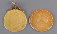 Lot 749 - A George III guinea, 1787; and a George III...