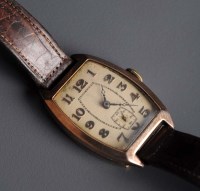 Lot 761 - A 1930's 9ct. gold cased wristwatch with...