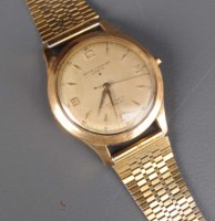 Lot 767 - Baume & Mercier: a gentleman's 18ct. gold...