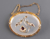 Lot 811 - A chalcedony seed pearl and amethyst brooch, c....