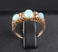 Lot 820 - An opal and diamond ring, c.1880, the three...