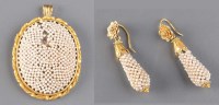 Lot 822 - A seed pearl and gold brooch, c.1860, the oval...