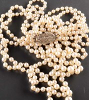 Lot 824 - A cultured pearl necklace composed of four...