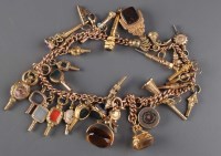 Lot 843 - A Victorian gold watch chain suspending a...